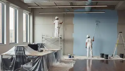 Los Angeles commercial painting team applying exterior paint on a business building